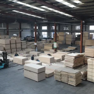 Inspection and packing process for plywood and engineered wood panels before shipment.