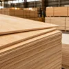 Commercial plywood production process showing veneer preparation, drying, gluing, pressing, trimming, and sanding.
