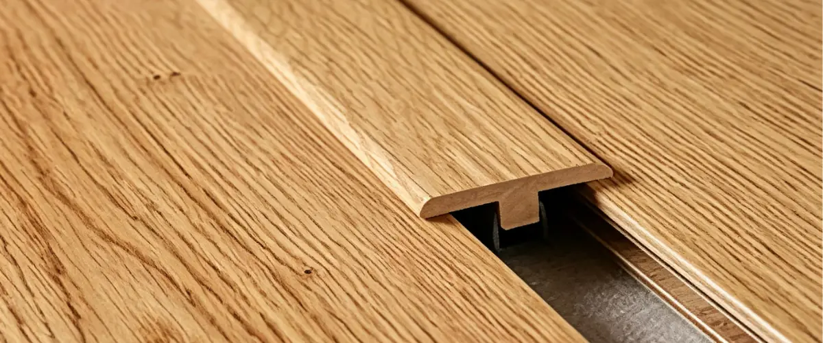 T-moulding and SPC flooring reducer create smooth transitions between different SPC flooring areas and floor materials.